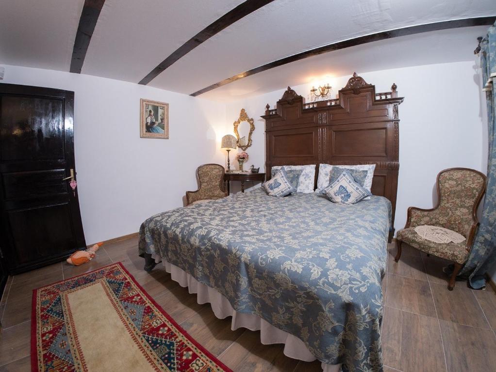 Postel nebo postele na pokoji v ubytování Pensiunea Casa Varvara