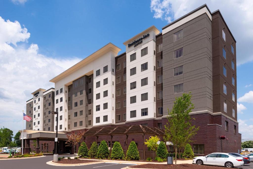 an exterior view of the hampton inn suites hotel at Residence Inn by Marriott Charlotte Northlake in Charlotte