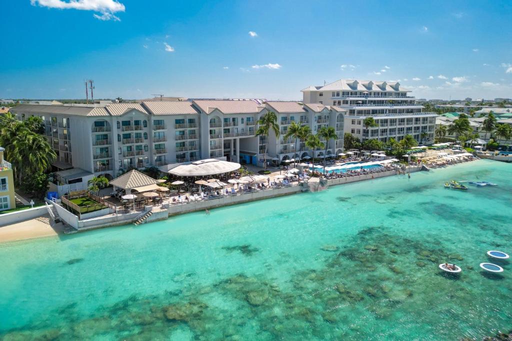 an aerial view of a resort and the ocean at Grand Cayman Marriott Resort in George Town