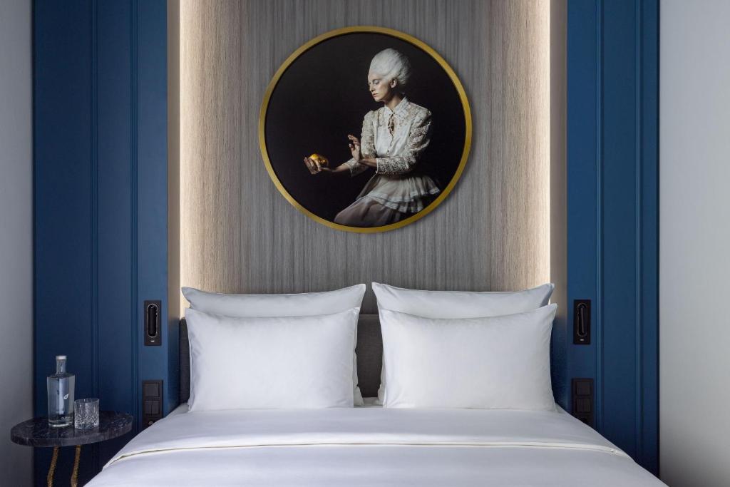 A bed or beds in a room at Hotel Luc, Autograph Collection