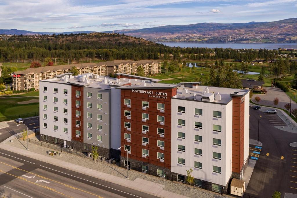 an aerial view of a building in a city at TownePlace Suites by Marriott West Kelowna in West Kelowna