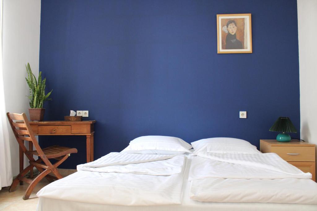 Postel nebo postele na pokoji v ubytování JR's House