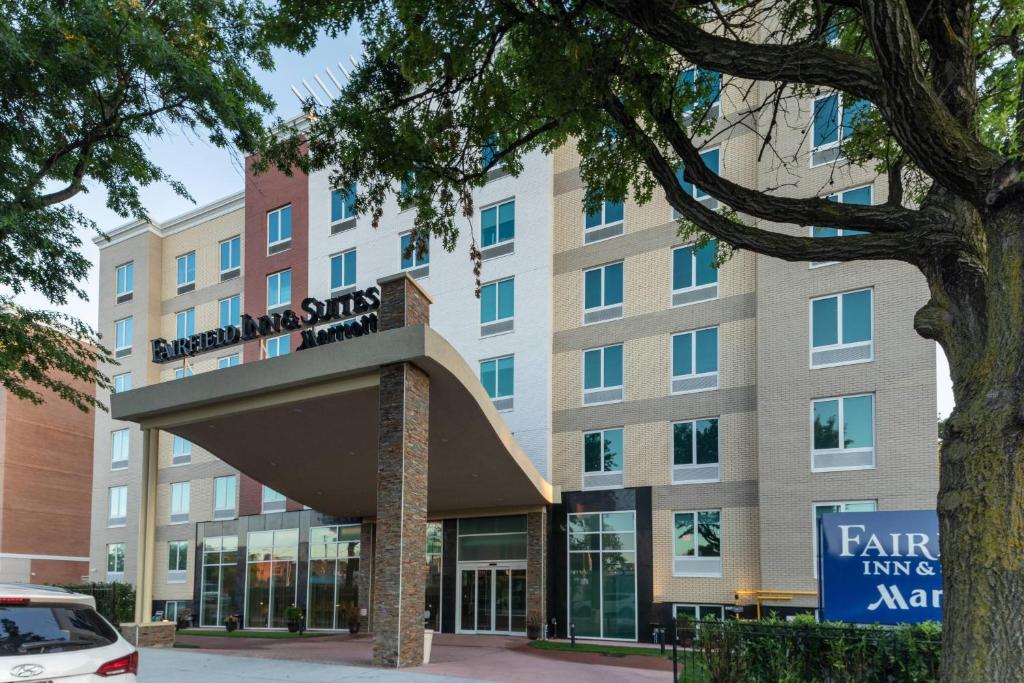 a rendering of the front of the fairrington inn suites building at Fairfield Inn & Suites by Marriott New York Queens/Fresh Meadows in Queens