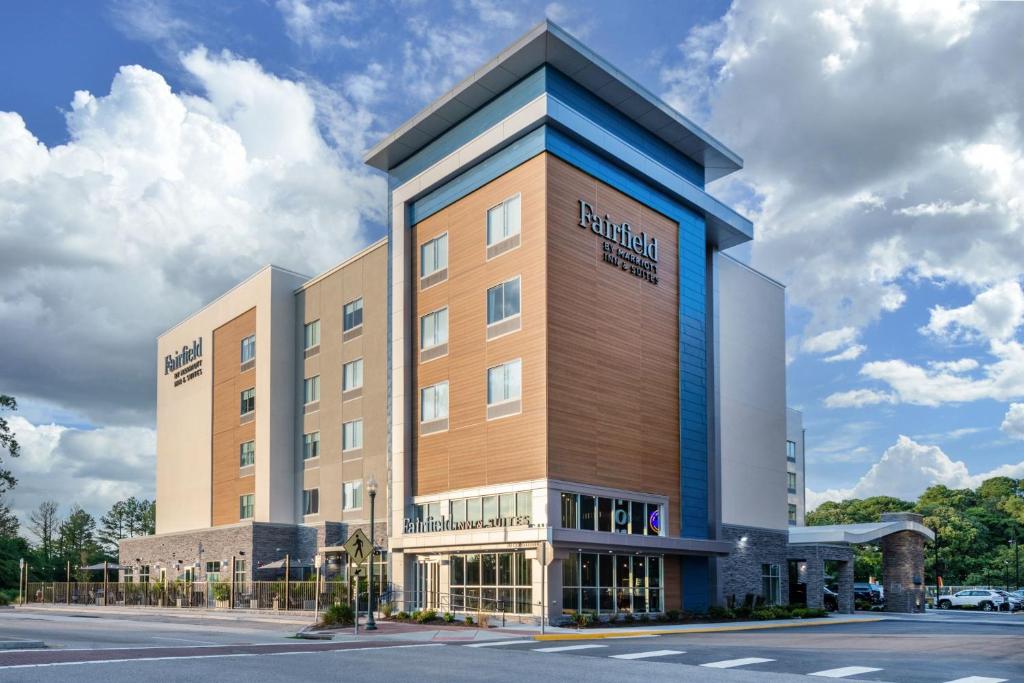 a building with a sign on the front of it at Fairfield by Marriott Inn & Suites Virginia Beach Town Center in Virginia Beach