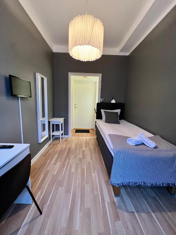 Vattengrändens Vandrarhem & Hotel Norrköping - Standaard Eenpersoonskamer Met Gedeelde Badkamer