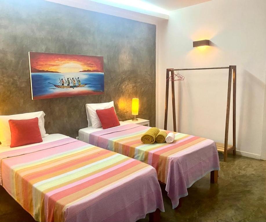 Postel nebo postele na pokoji v ubytování Hotel Kriola