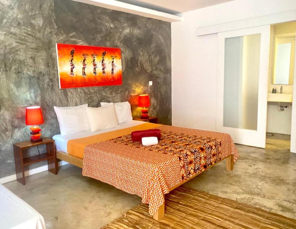 Postel nebo postele na pokoji v ubytování Hotel Kriola