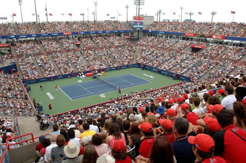 a large crowd of people watching a tennis match at Fairfield Inn & Suites by Marriott Montreal Airport in Dorval