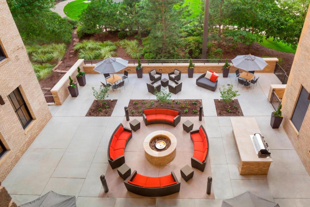 an overhead view of a patio with tables and chairs at Residence Inn by Marriott Omaha Downtown Old Market Area in Omaha
