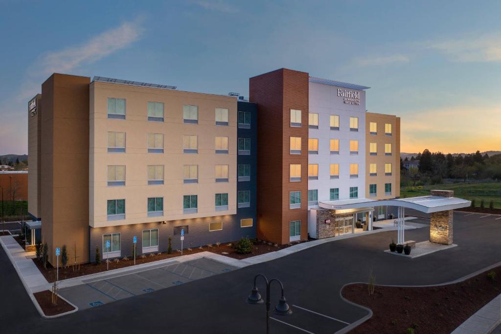 a rendering of a hotel building with a parking lot at Fairfield Inn & Suites by Marriott Santa Rosa Rohnert Park in Rohnert Park