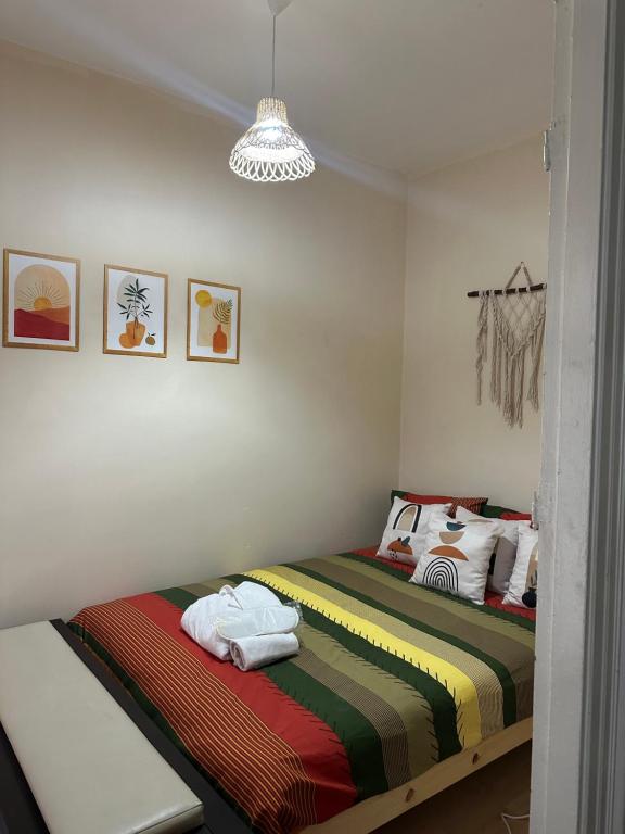 Postel nebo postele na pokoji v ubytování Nelly Guesthouse
