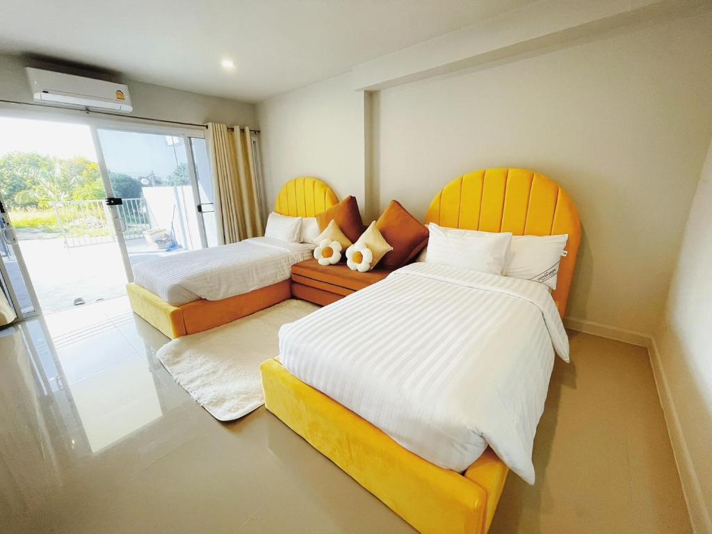 Postel nebo postele na pokoji v ubytování PK Villa Koh Samui