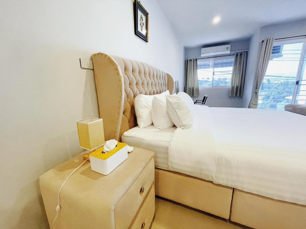 Postel nebo postele na pokoji v ubytování PK Villa Koh Samui