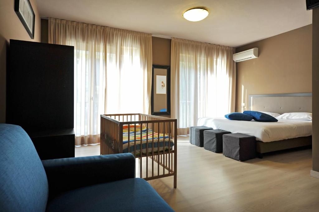 Postel nebo postele na pokoji v ubytování M14 Hotel & Spa