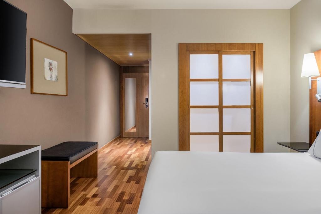 Postel nebo postele na pokoji v ubytování AC Hotel Guadalajara by Marriott, Spain