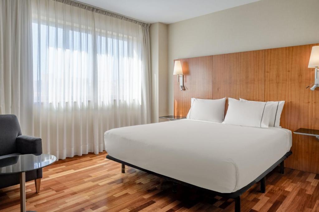 Postel nebo postele na pokoji v ubytování AC Hotel Guadalajara by Marriott, Spain