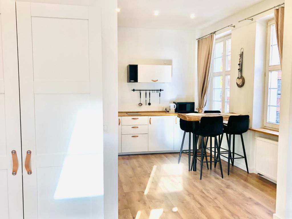 Kuchyňa alebo kuchynka v ubytovaní Apartament Szeroka Old Town