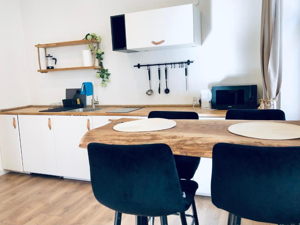 Kuchyňa alebo kuchynka v ubytovaní Apartament Szeroka Old Town