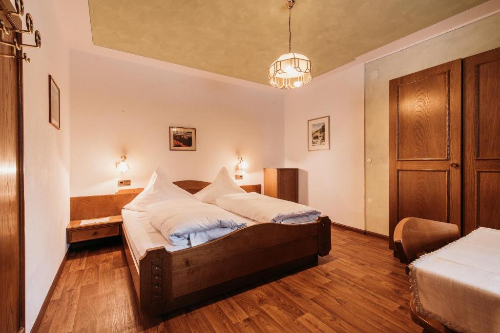 Postel nebo postele na pokoji v ubytování Gästehaus Marianne Terenten