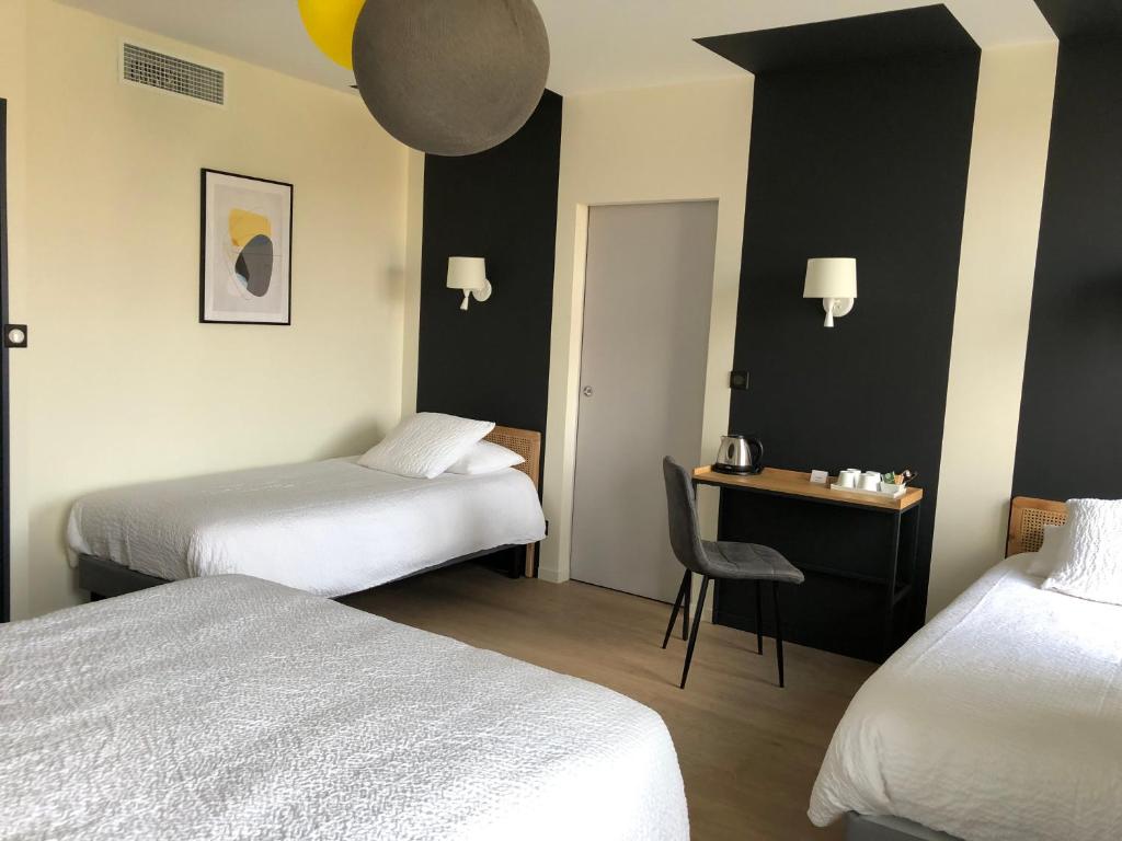 Postel nebo postele na pokoji v ubytování Hôtel de la Glane