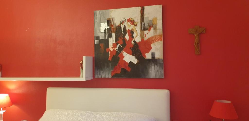 A bed or beds in a room at Monteceneri 9 B&b