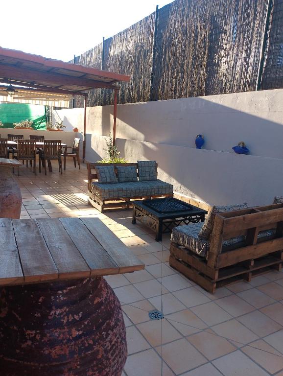 Patio nebo venkovní prostory v ubytování Quevoy