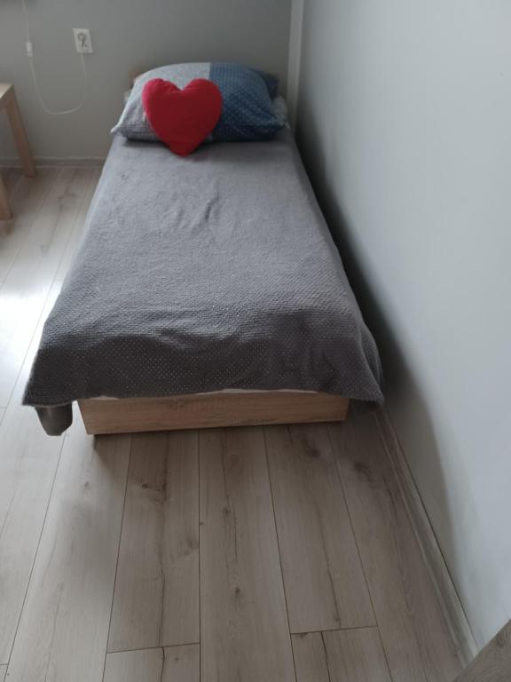 Postel nebo postele na pokoji v ubytování Agroturystyka Zielone Wzgorze
