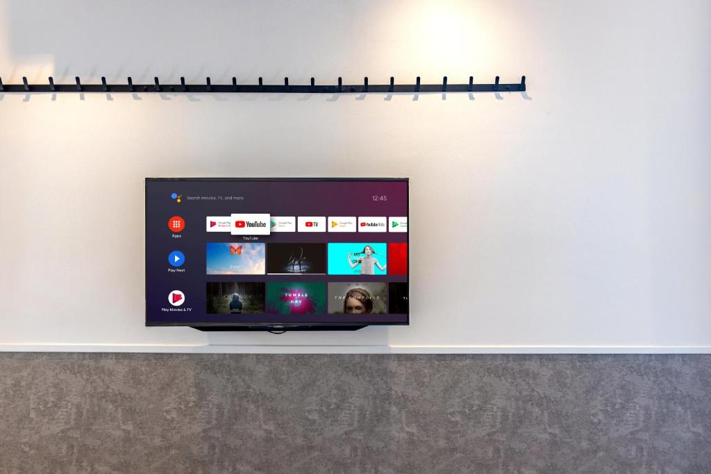 TV a/nebo společenská místnost v ubytování Bagan Suite