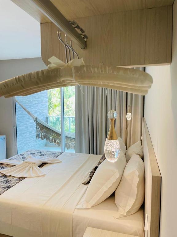 Postel nebo postele na pokoji v ubytování Pousada Maracabana Spa