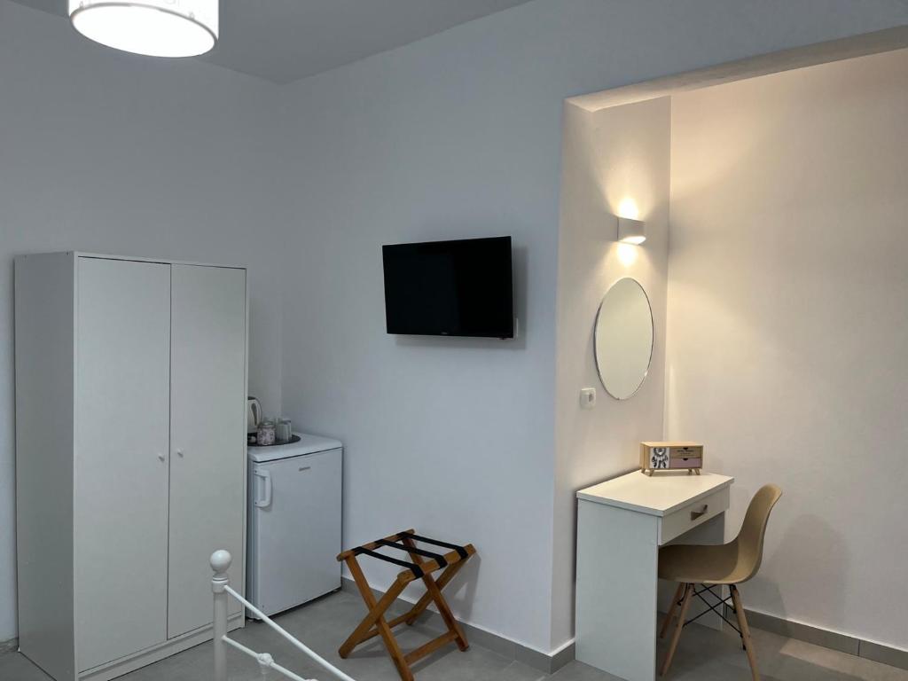 TV a/nebo společenská místnost v ubytování Firaxenia rooms