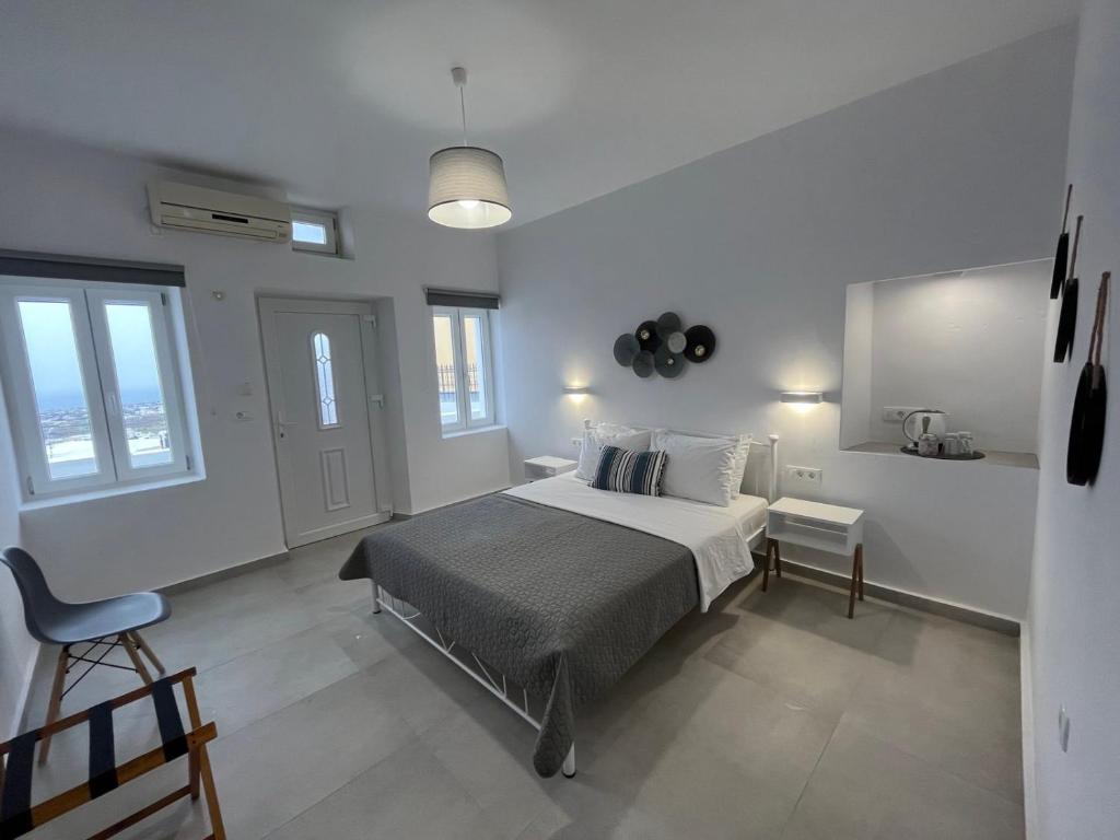 Postel nebo postele na pokoji v ubytování Firaxenia rooms
