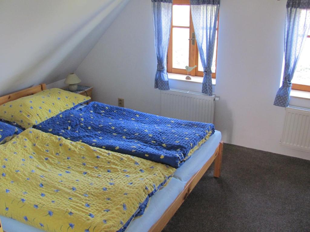 Postel nebo postele na pokoji v ubytování Roubenka Aneta
