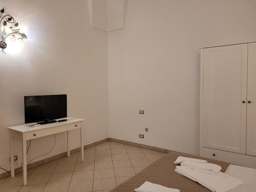 TV a/nebo společenská místnost v ubytování Casal Sant'Angelo