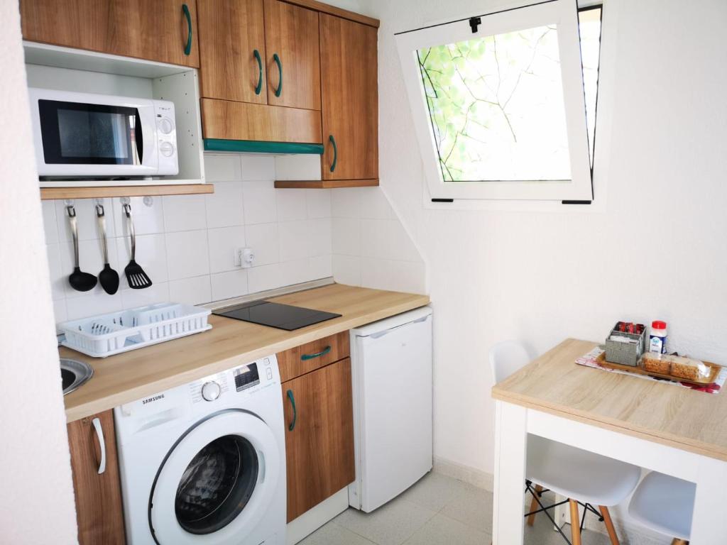 A kitchen or kitchenette at ElRincónDeSara