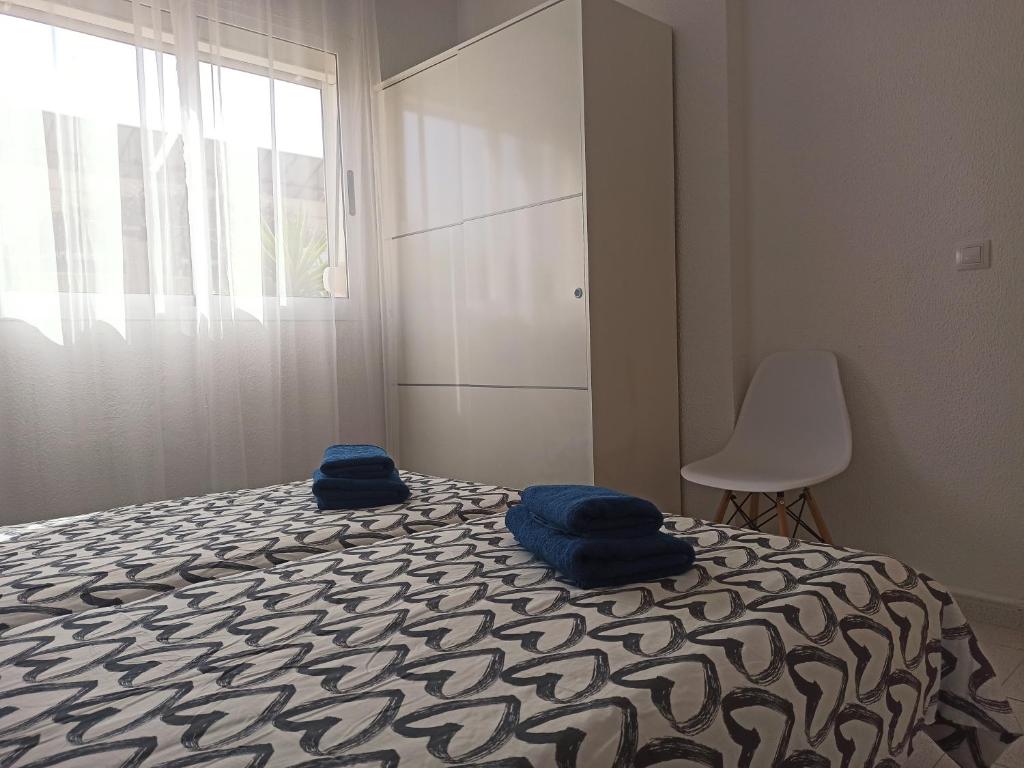 A bed or beds in a room at ElRincónDeSara