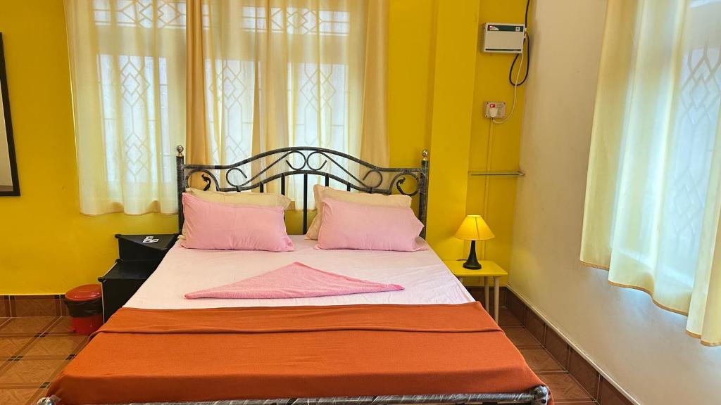 Postel nebo postele na pokoji v ubytování Muffys Holiday Home