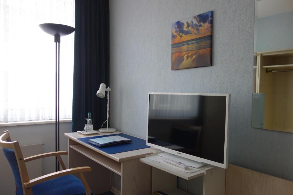 TV a/nebo společenská místnost v ubytování Hotel Lex