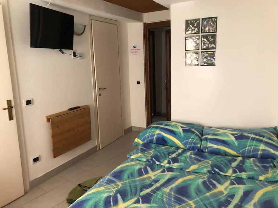 Cama o camas de una habitación en Appartamento Viconago