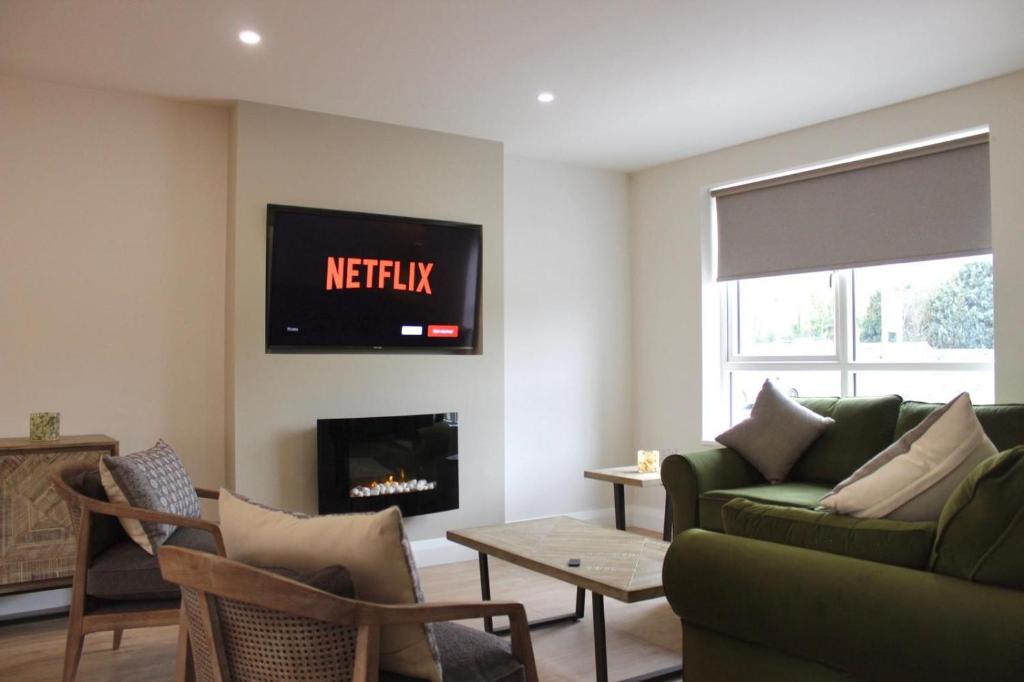 TV a/nebo společenská místnost v ubytování Bunratty west Townhouse