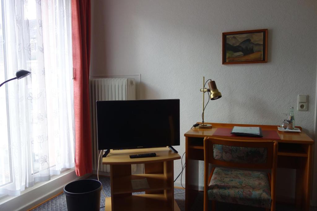TV a/nebo společenská místnost v ubytování Hotel Lex