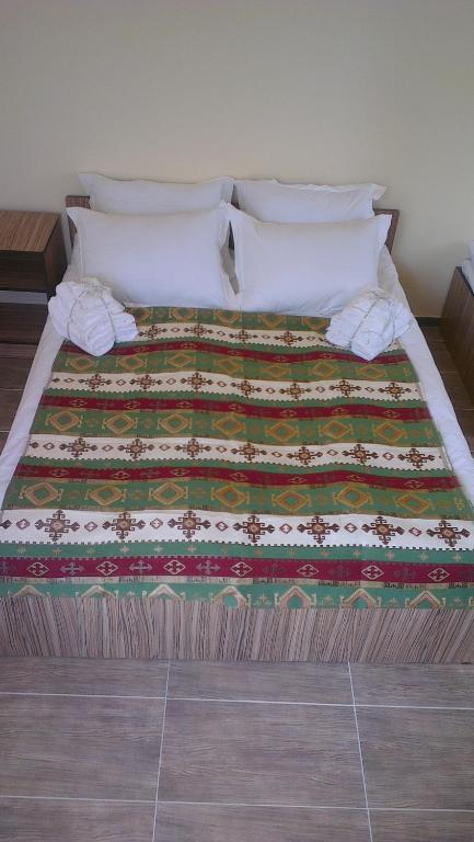 Postel nebo postele na pokoji v ubytování Zanger Hotel