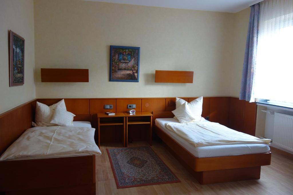 Postel nebo postele na pokoji v ubytování Hotel Lex
