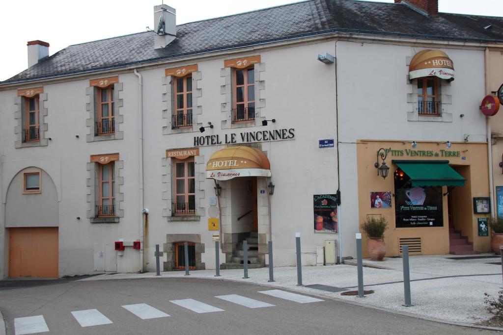 a building on the corner of a street at Les Pastels in La Roche-sur-Yon