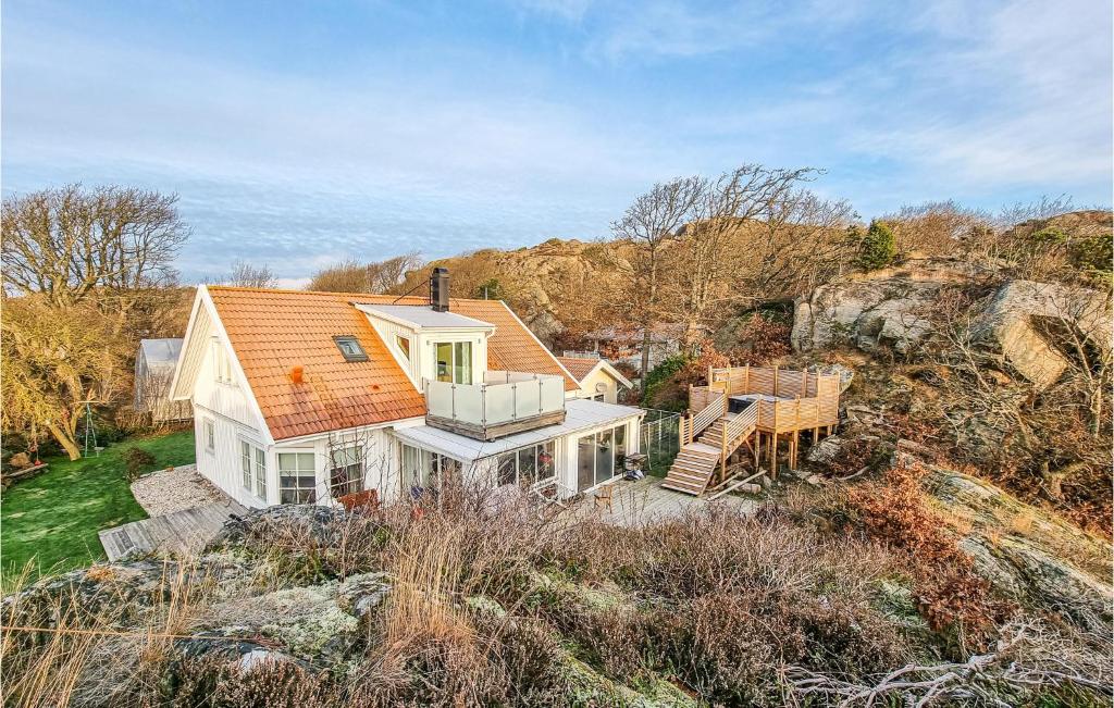 an aerial view of a house on a hill at Pet Friendly Home In Rnnng With House Sea View in Rönnäng