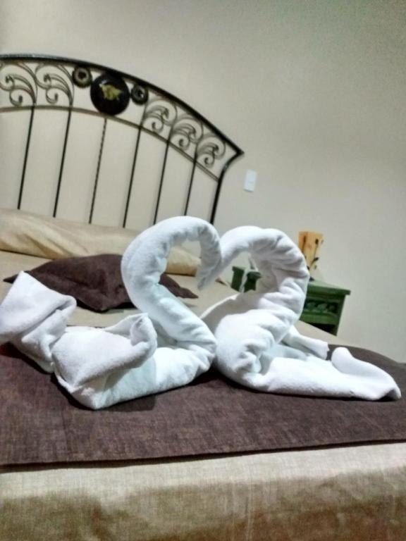 Postel nebo postele na pokoji v ubytování HOTEL PLAZA PACHUCA