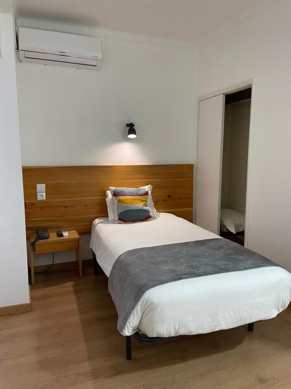 Postel nebo postele na pokoji v ubytování Hotel Ilha