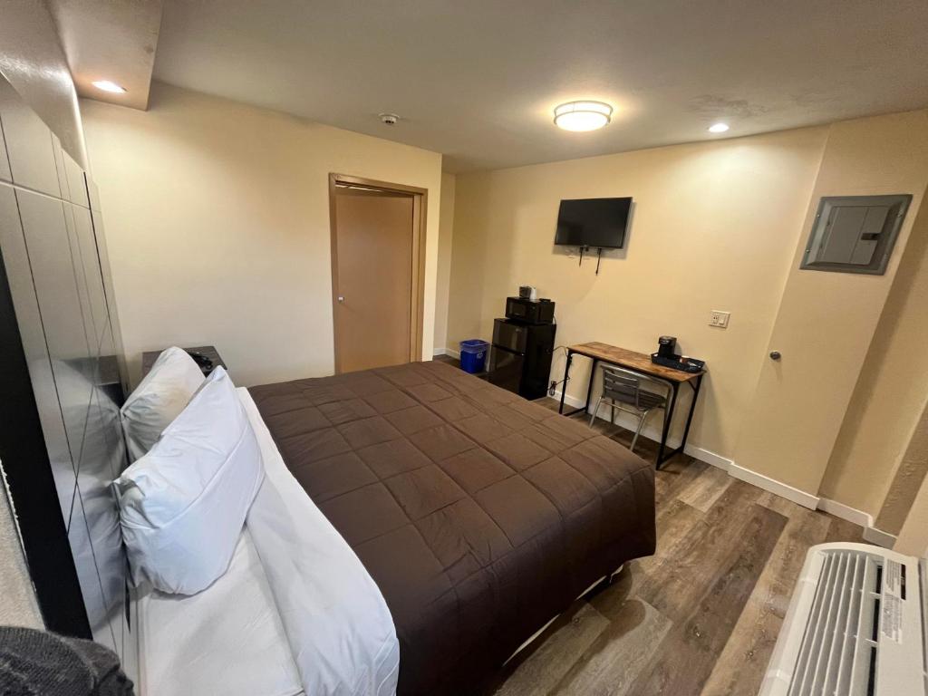 TV a/nebo společenská místnost v ubytování Circle Motor Lodge
