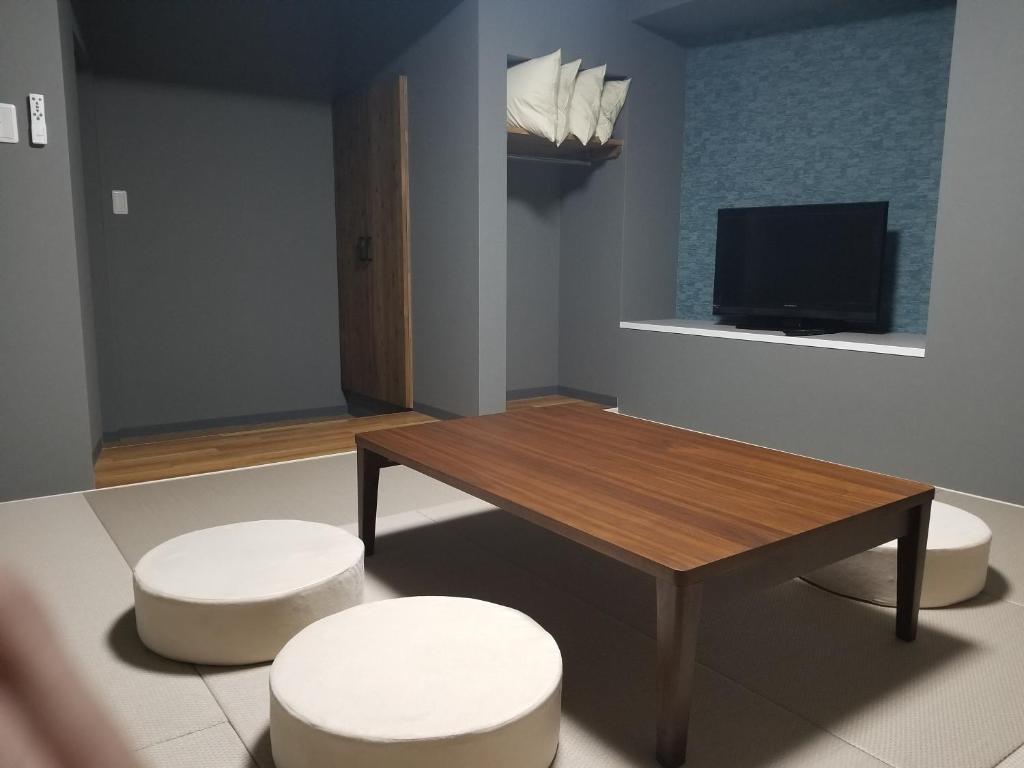 TV a/nebo společenská místnost v ubytování Hotel Eco Dogo