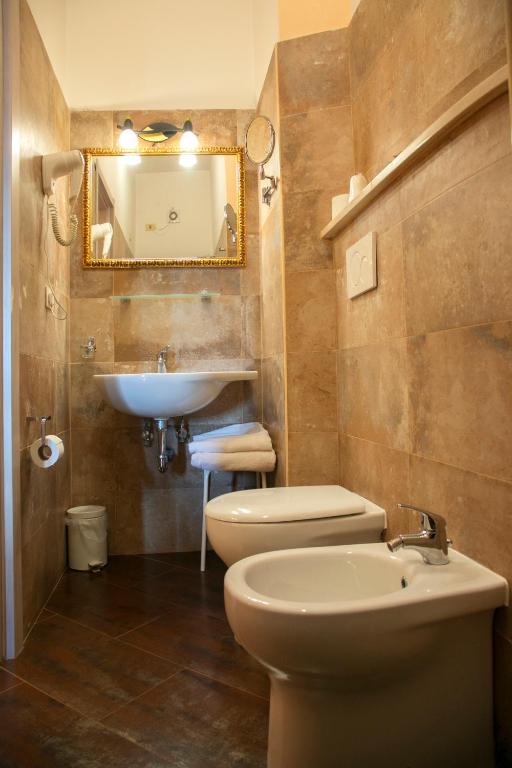 Koupelna v ubytování Hotel Merlini