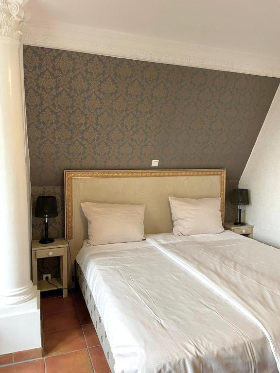 Postel nebo postele na pokoji v ubytování Hotel Borchers